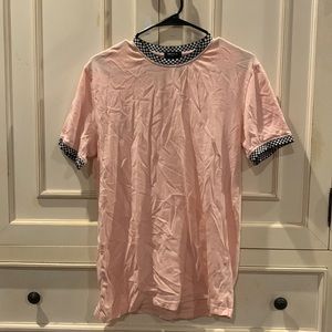 pink collared shirt